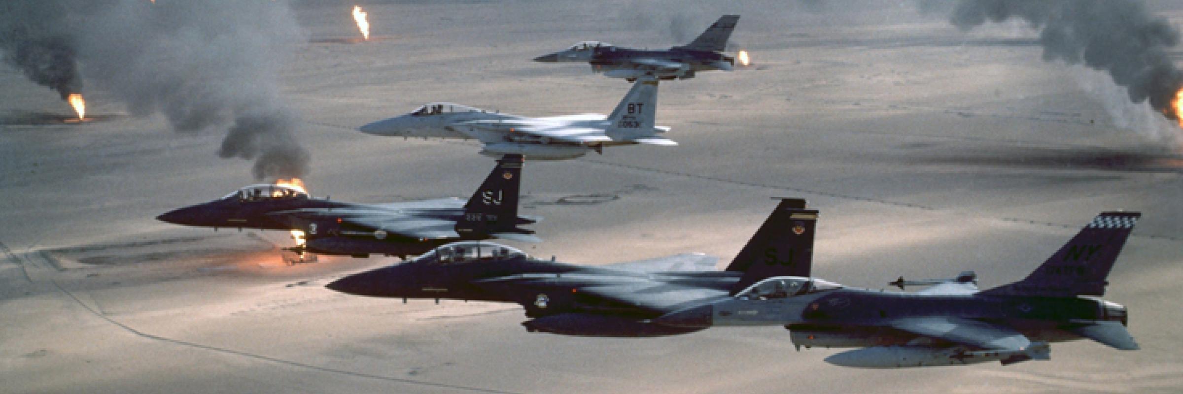 A group of airplanes flying in formation in a smoky sky.