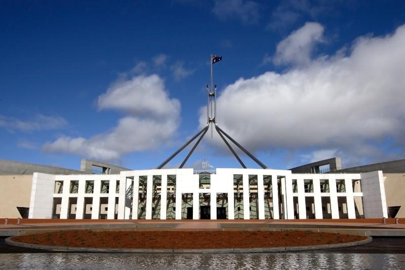 Image of a building with water in front of it