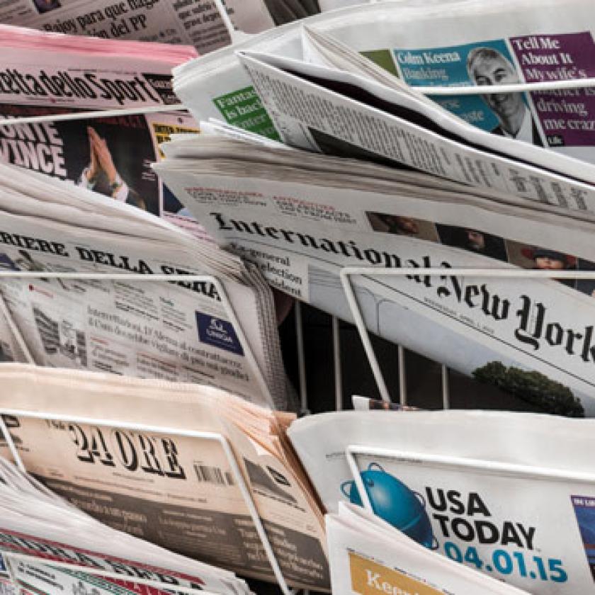 A number of foreign newspapers in a newspaper stand